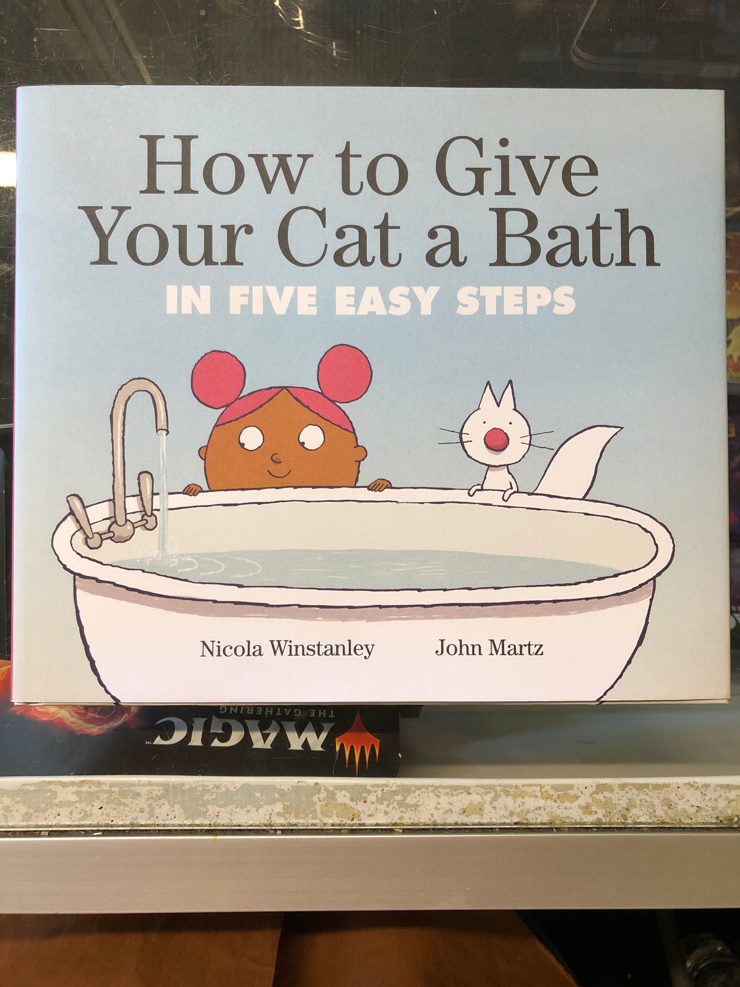 How to Give Your Cat A Bath - hardcover